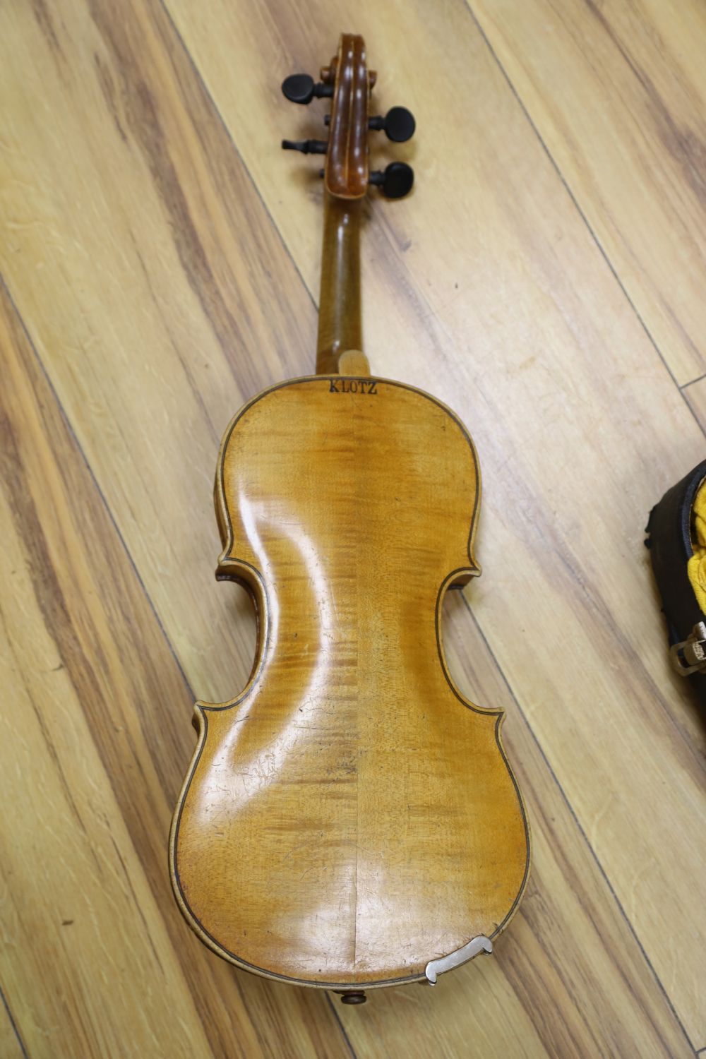 A late 19th century German 1/2 size violin bears label Joseph Klotz Mittenwald, cased